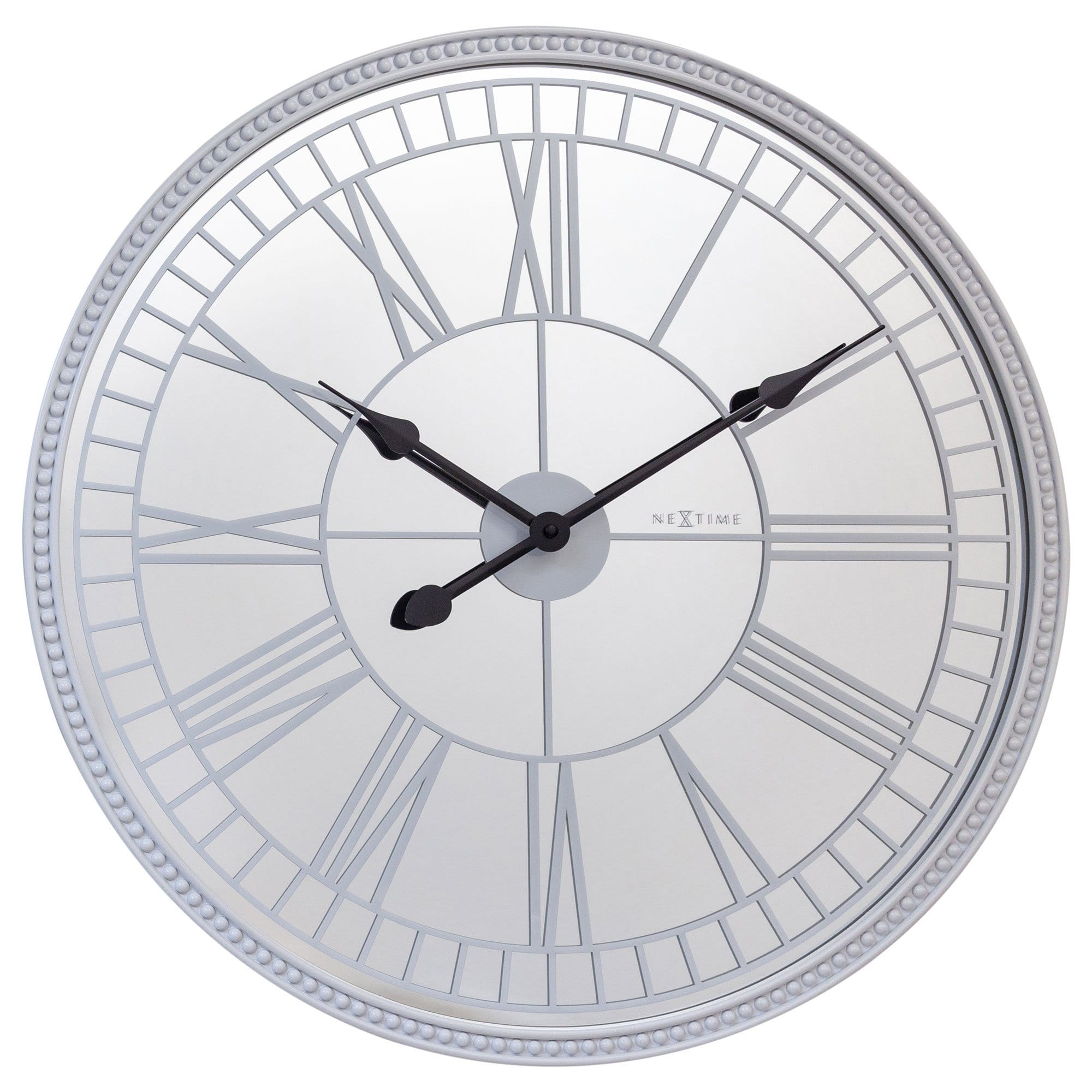 Large 56cm NeXtime Clocks wall clock with mirror finish, silent mechanism, glass face, titled "Cleopatra's Mirror" design.